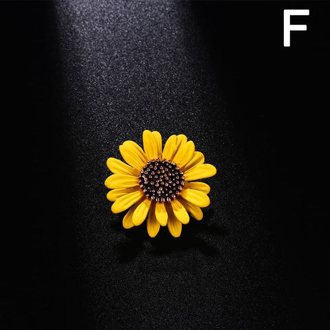 Brosa din aliaj aurie V7 floare