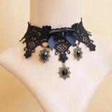 Colier choker negru cu accesoriu fundita din saten