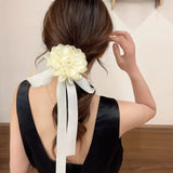 Clama de par tip floare din satin