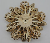 Brosa din aliaj aurie V5