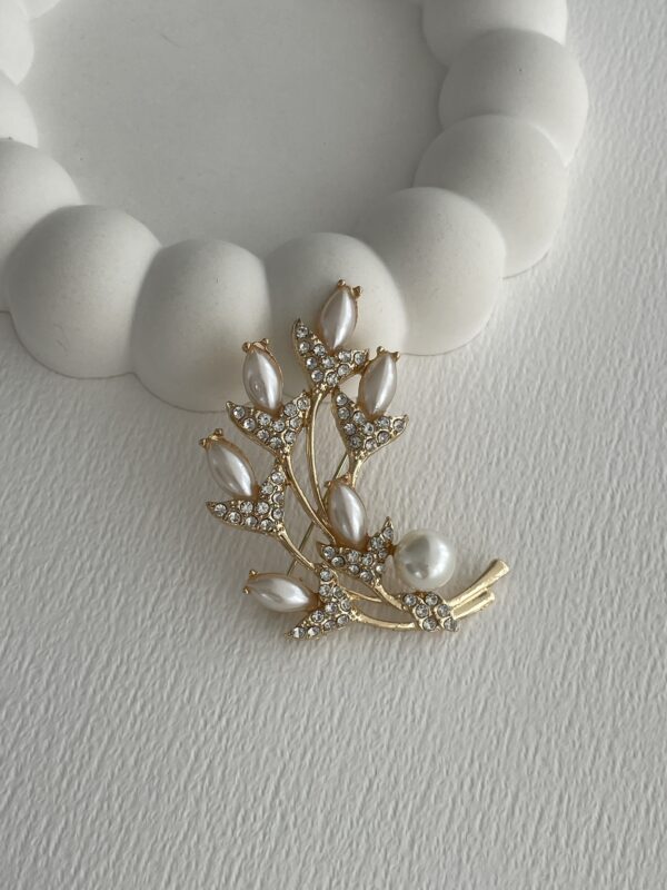 Brosa din aliaj aurie V6